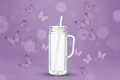 Single Clear Snow Globe Tumbler with Handle on Lavender Butterfly Background
